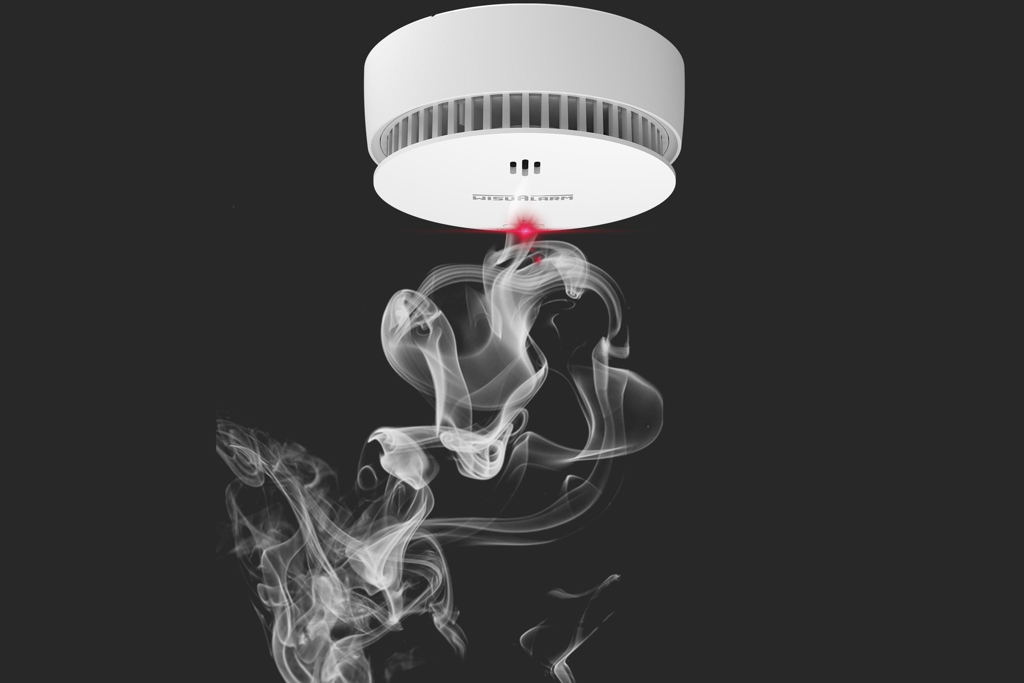 What is the difference between a smoke detector and a smoke alarm?